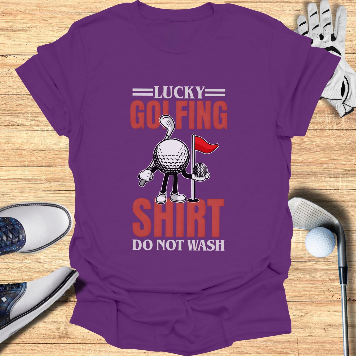 Purple t-shirt with "Lucky Golfing Shirt Do Not Wash" text and golf ball graphic.