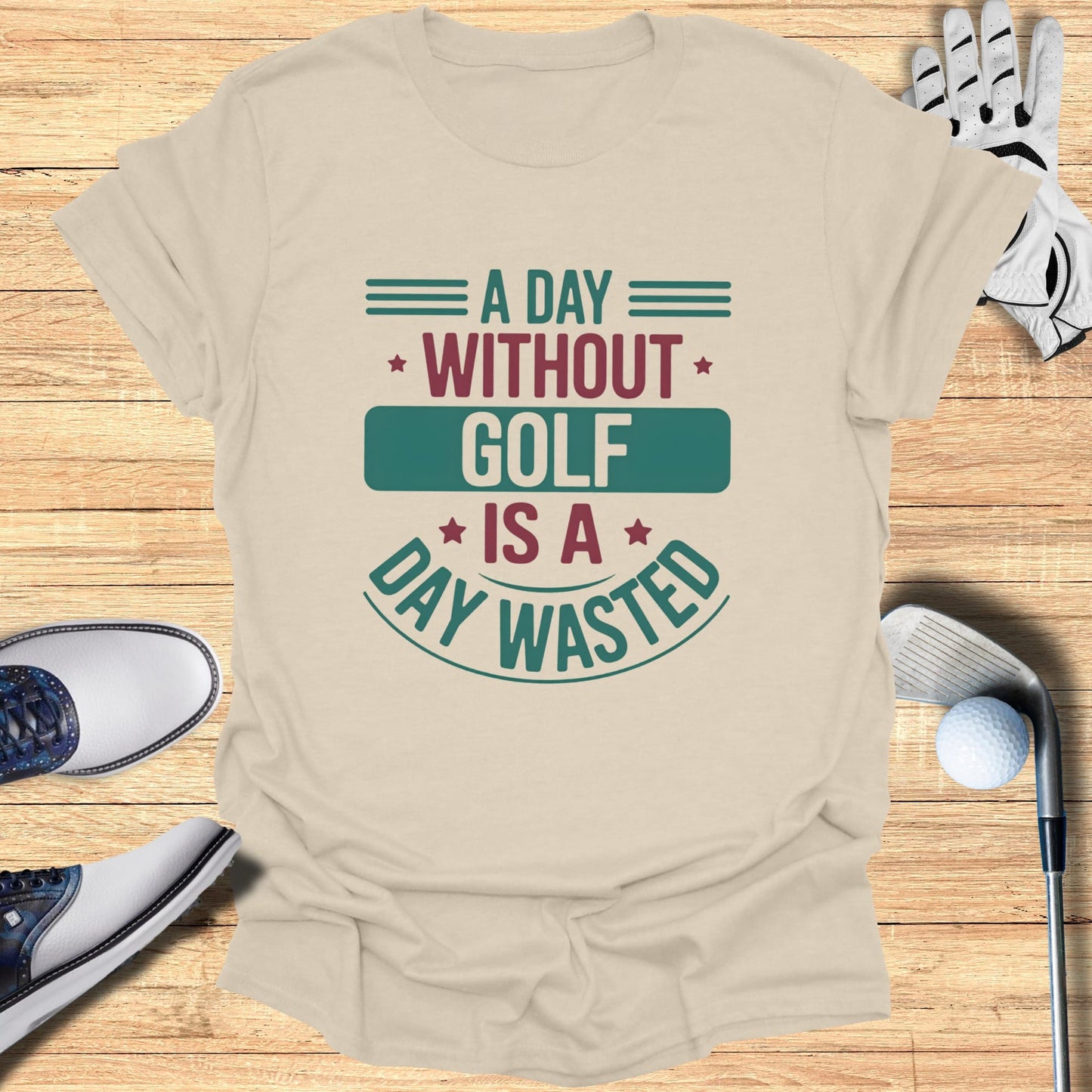 T-shirt with text "A day without golf is a day wasted".