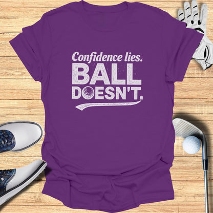 Purple t-shirt with "Confidence lies. BALL DOESN'T." and a golf ball graphic.