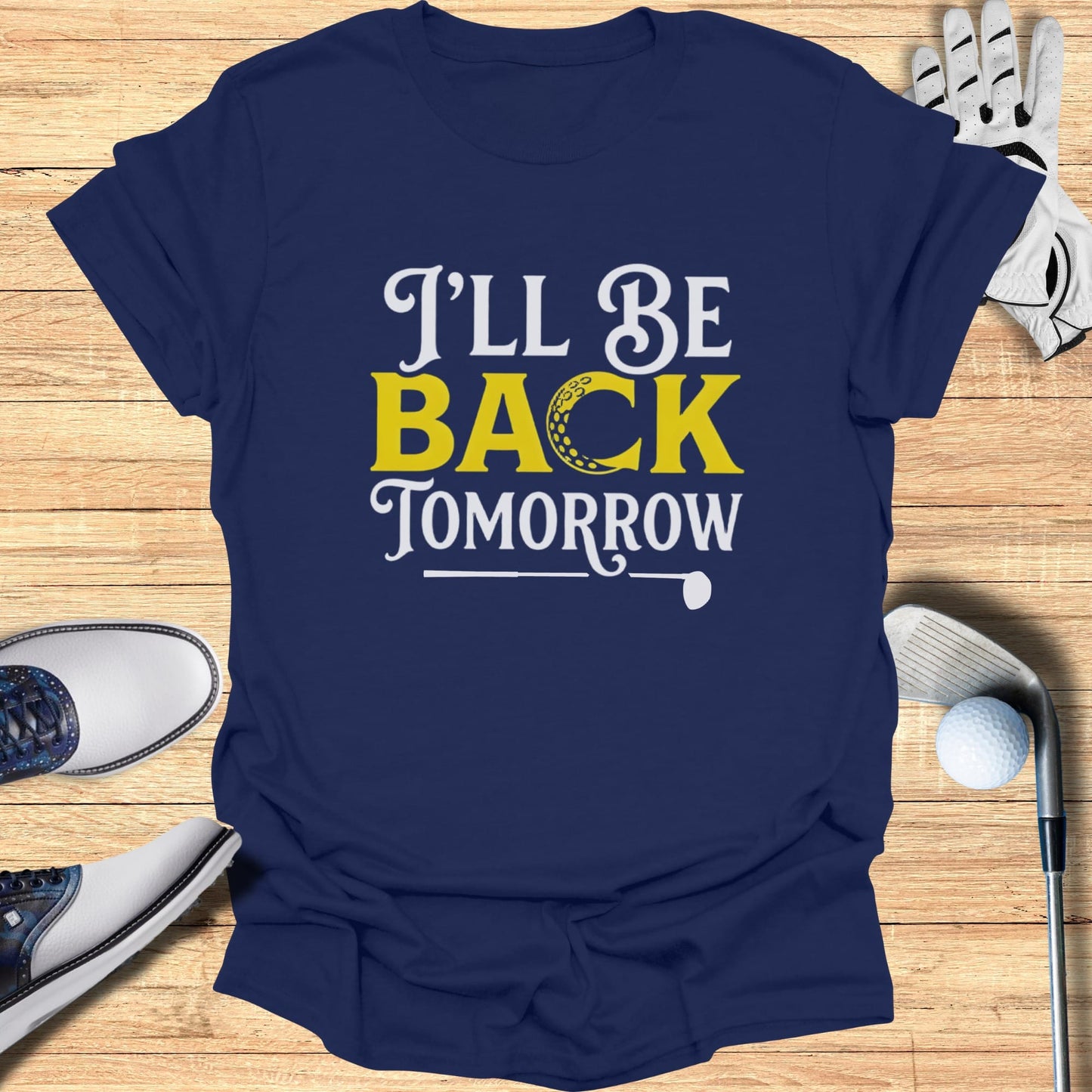 Navy t-shirt with "I'll Be Back Tomorrow" and a golf ball graphic.