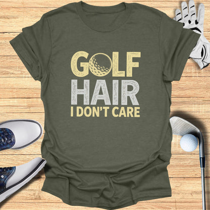 Green t-shirt with "GOLF HAIR I DON'T CARE" and golf ball graphic.