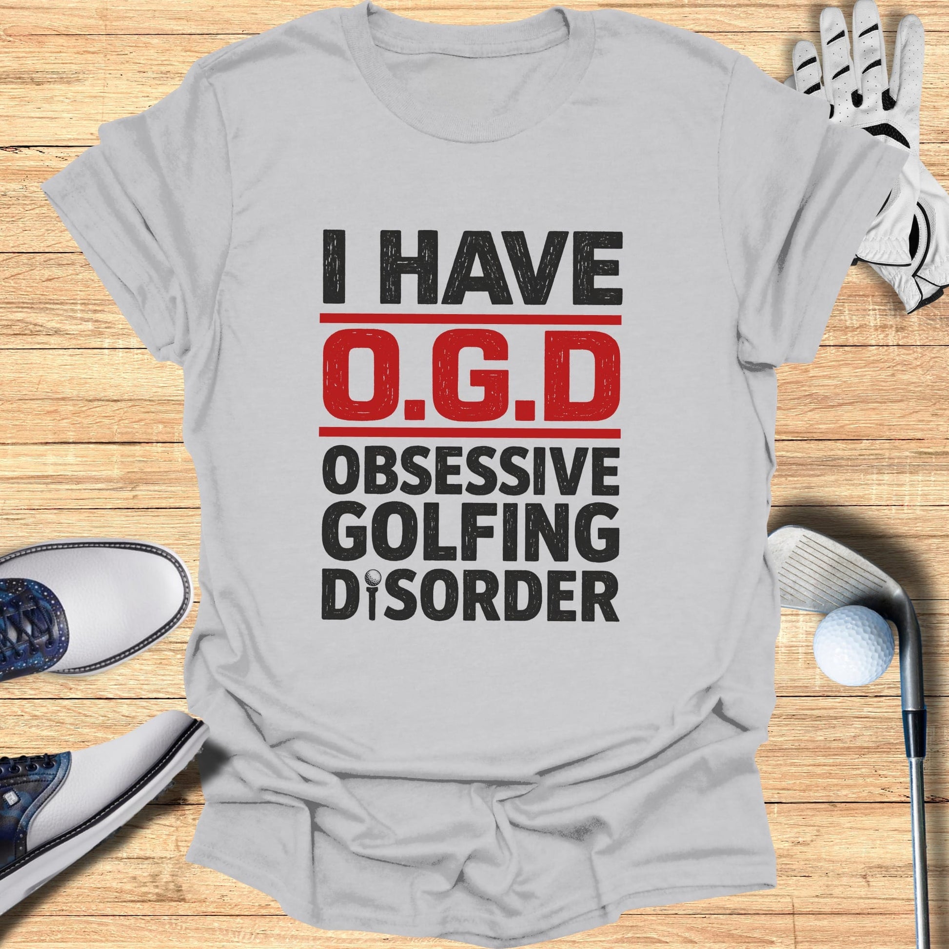 Grey t-shirt with "I HAVE O.G.D. OBSESSIVE GOLFING DISORDER" text.