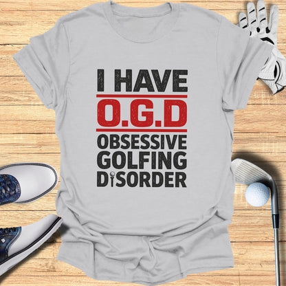 Grey t-shirt with "I HAVE O.G.D. OBSESSIVE GOLFING DISORDER" text.