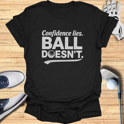Black t-shirt with white text: "Confidence lies. BALL DOESN'T."