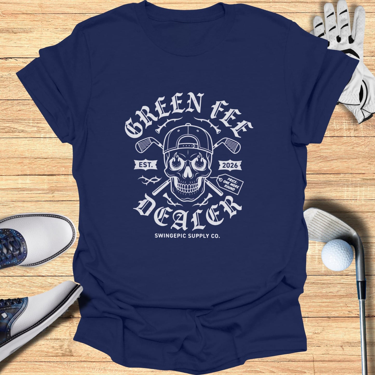 Navy t-shirt with "Green Fee Dealer" skull and golf club graphic.