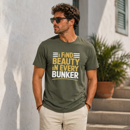 Man in olive green t-shirt with text "FIND BEAUTY IN EVERY BUNKER".
