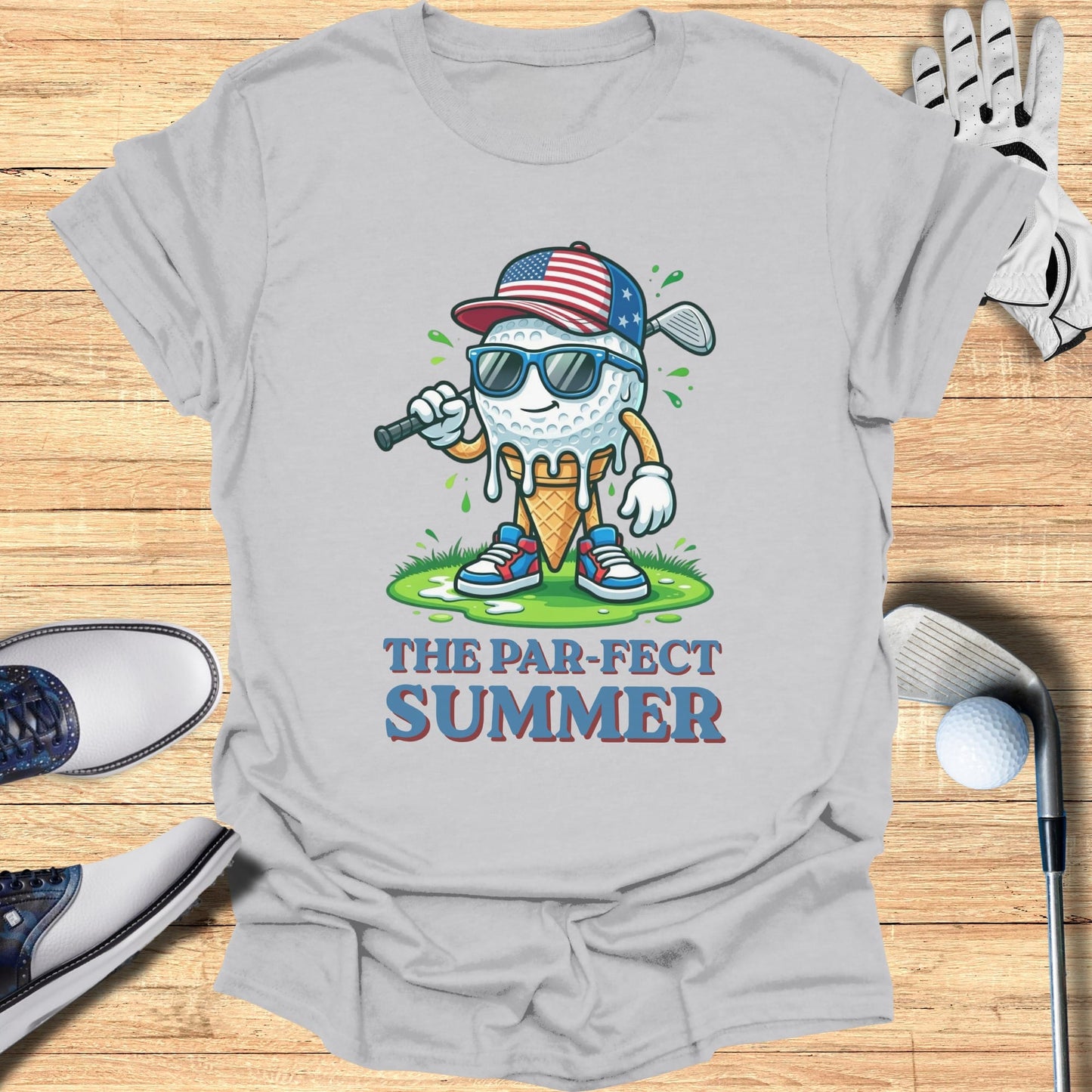 Golf ball character with sunglasses and ice cream cone on American flag hat.