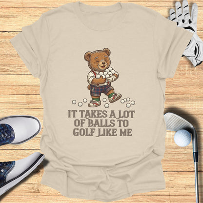 Bear holding golf balls with text "It takes a lot of balls to golf like me".