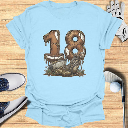 Golf-themed "18" graphic on a light blue t-shirt with golf clubs and ball.