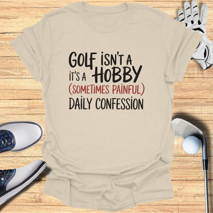 T-shirt with text "Golf isn't a hobby, it's a (sometimes painful) daily confession."