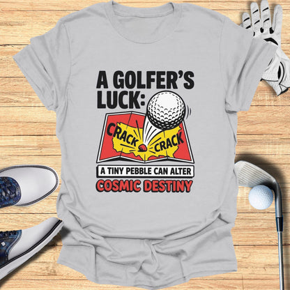 T-shirt with "A Golfer's Luck: A Tiny Pebble Can Alter Cosmic Destiny" text and golf ball.