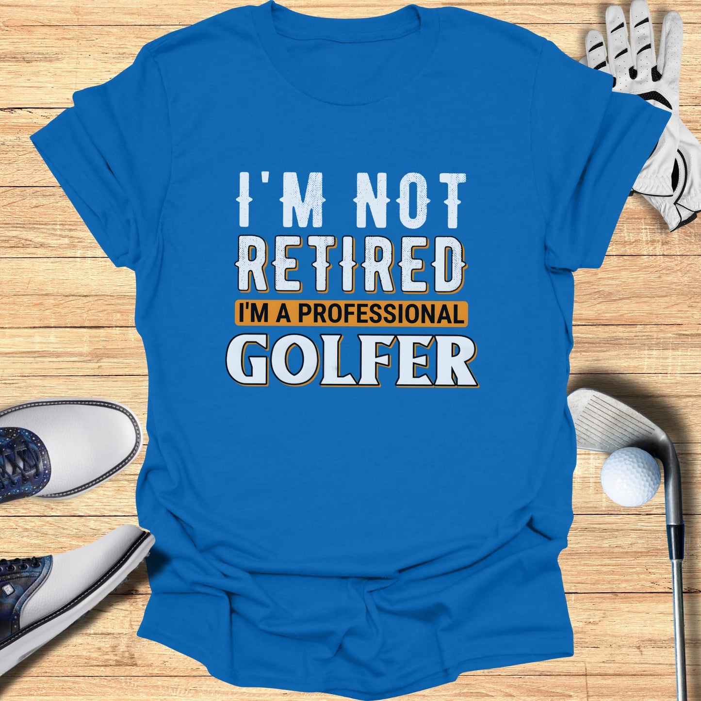 Blue t-shirt with "I'm Not Retired I'm A Professional Golfer" text.