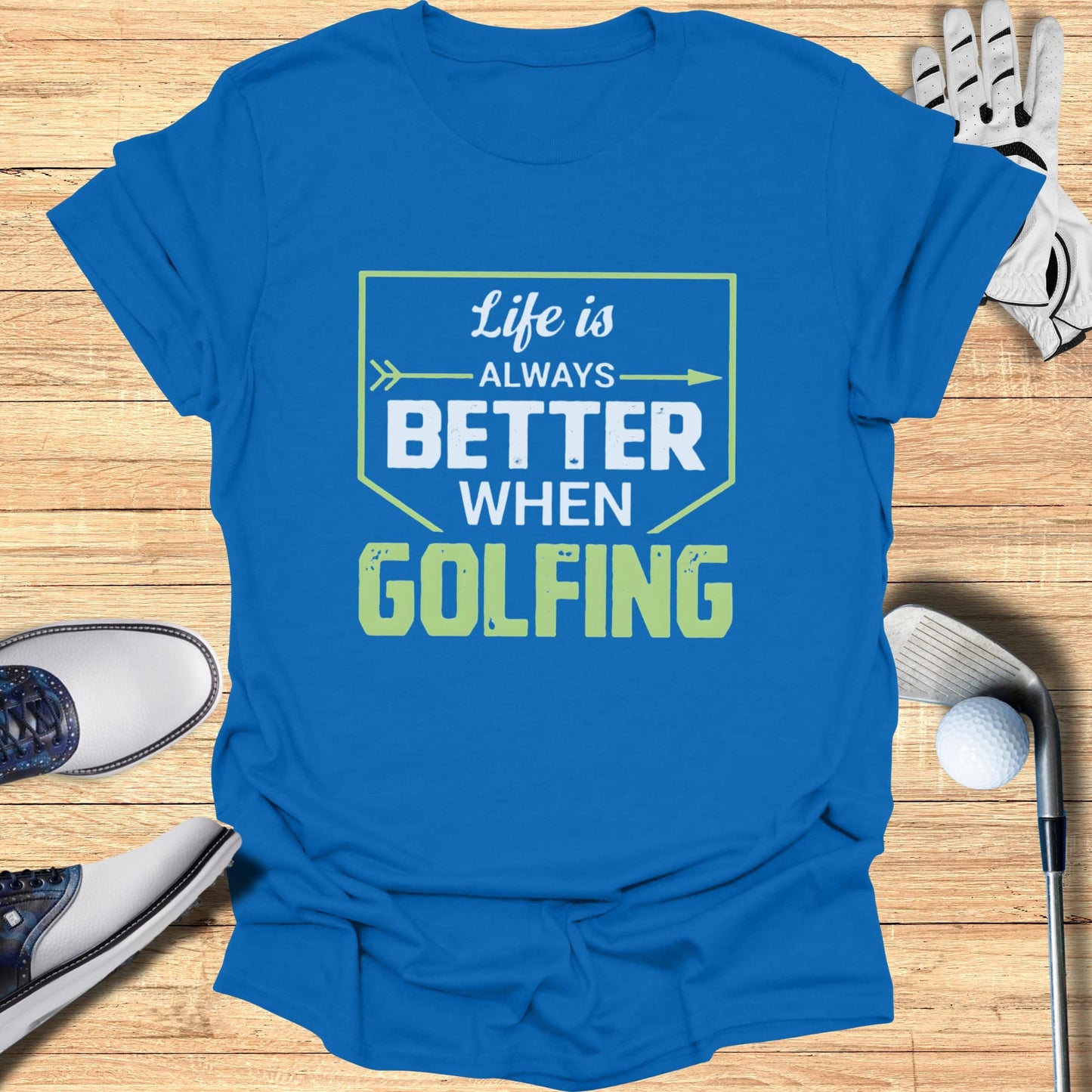 Blue t-shirt with text "Life is always better when golfing".