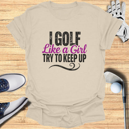 T-shirt with text "I golf like a girl try to keep up".