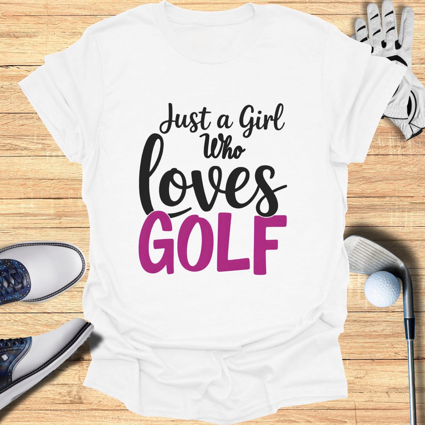 White t-shirt with "Just a Girl Who Loves GOLF" text, golf club, and ball.