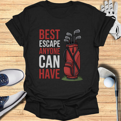 Red golf bag and clubs on black t-shirt with "BEST ESCAPE ANYONE CAN HAVE" text.