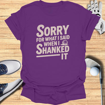 Purple t-shirt with "Sorry for what I said when I shanked it" text.
