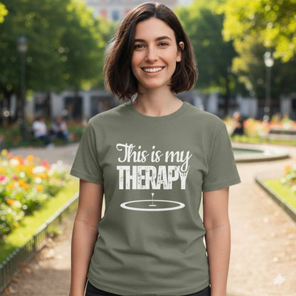 Woman wearing a grey t-shirt with white text that says "This is my therapy".
