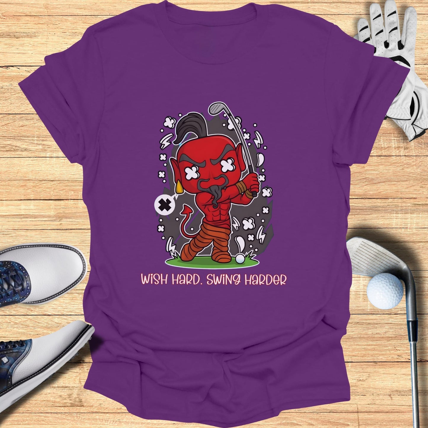 Devil character swinging a golf club with text "Wish Hard. Swing Harder."