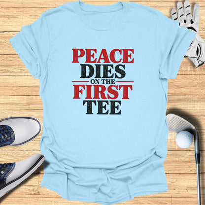 Light blue t-shirt with "Peace Dies on the First Tee" text.