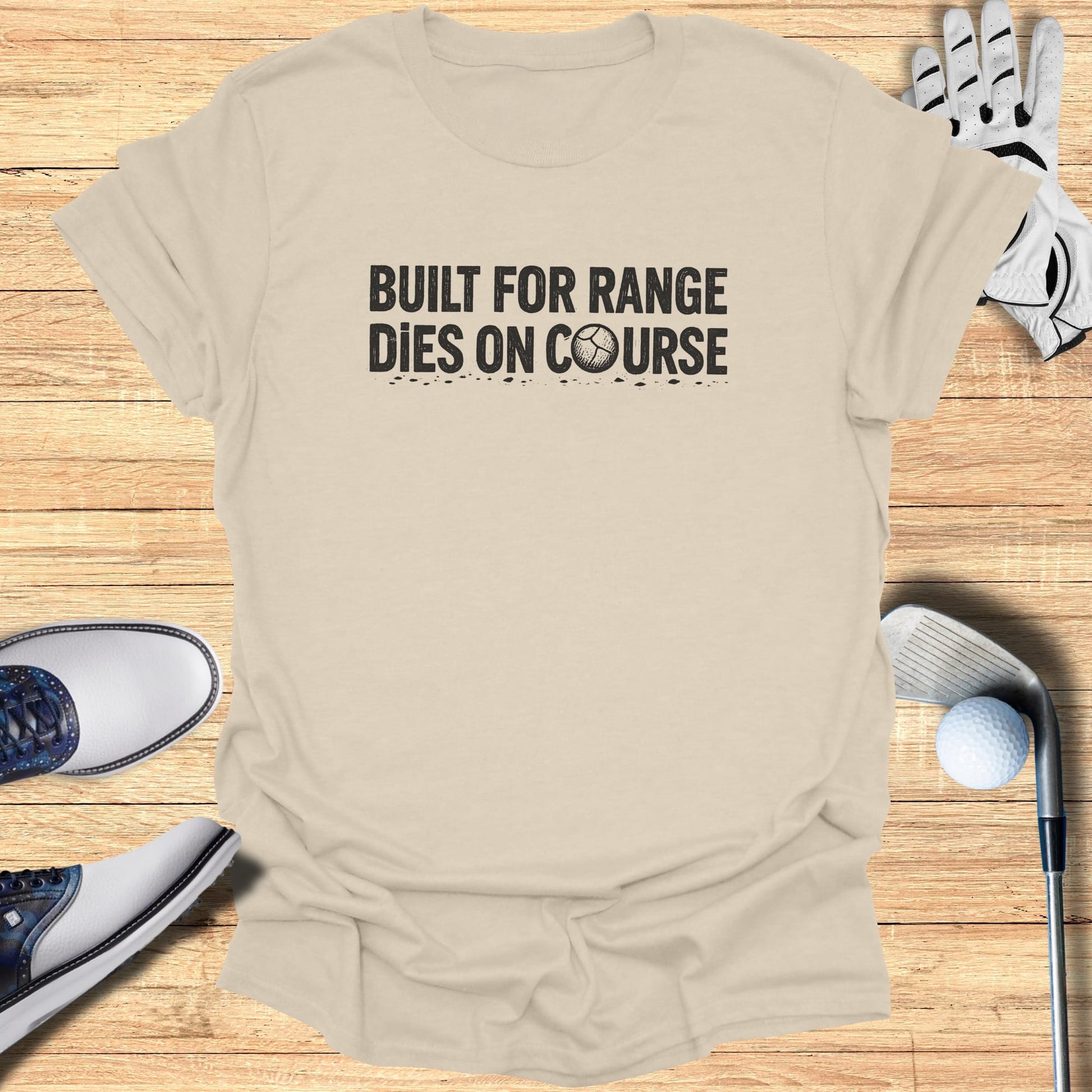 T-shirt with "Built for Range Dies on Course" text and golf accessories.
