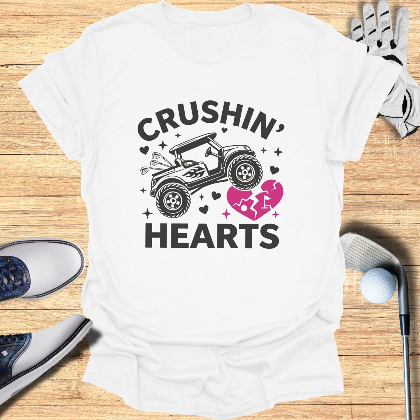 White t-shirt with "Crushin' Hearts" and a golf cart design.