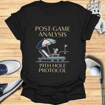T-shirt with "POST-GAME ANALYSIS 19TH HOLE PROTOCOL" and golf imagery.