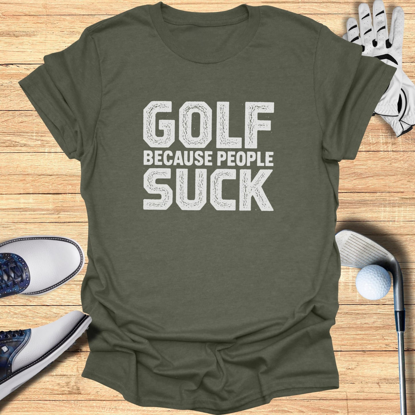 Olive green t-shirt with "GOLF BECAUSE PEOPLE SUCK" text.
