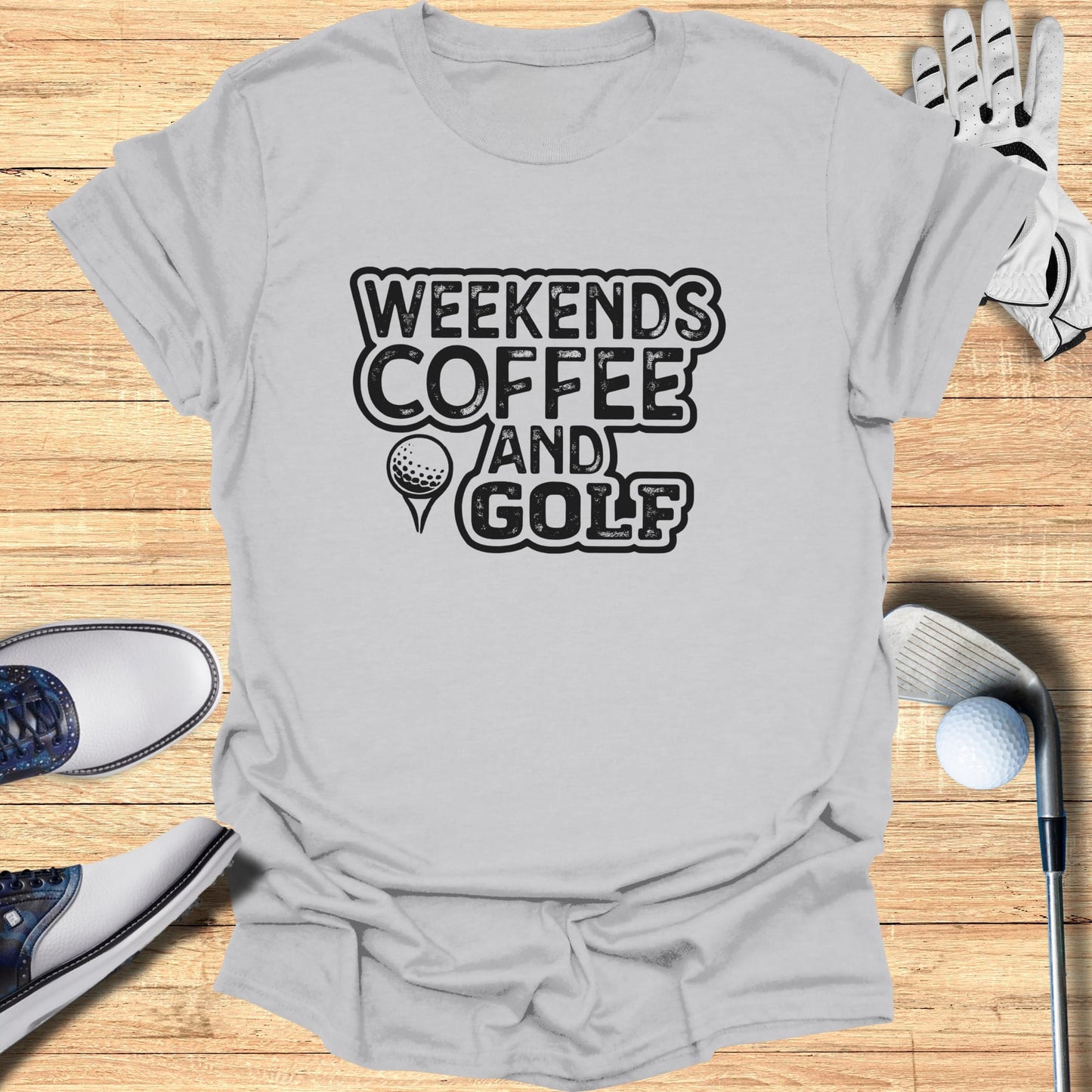 Graphic tee with "Weekends Coffee And Golf" text and golf elements.