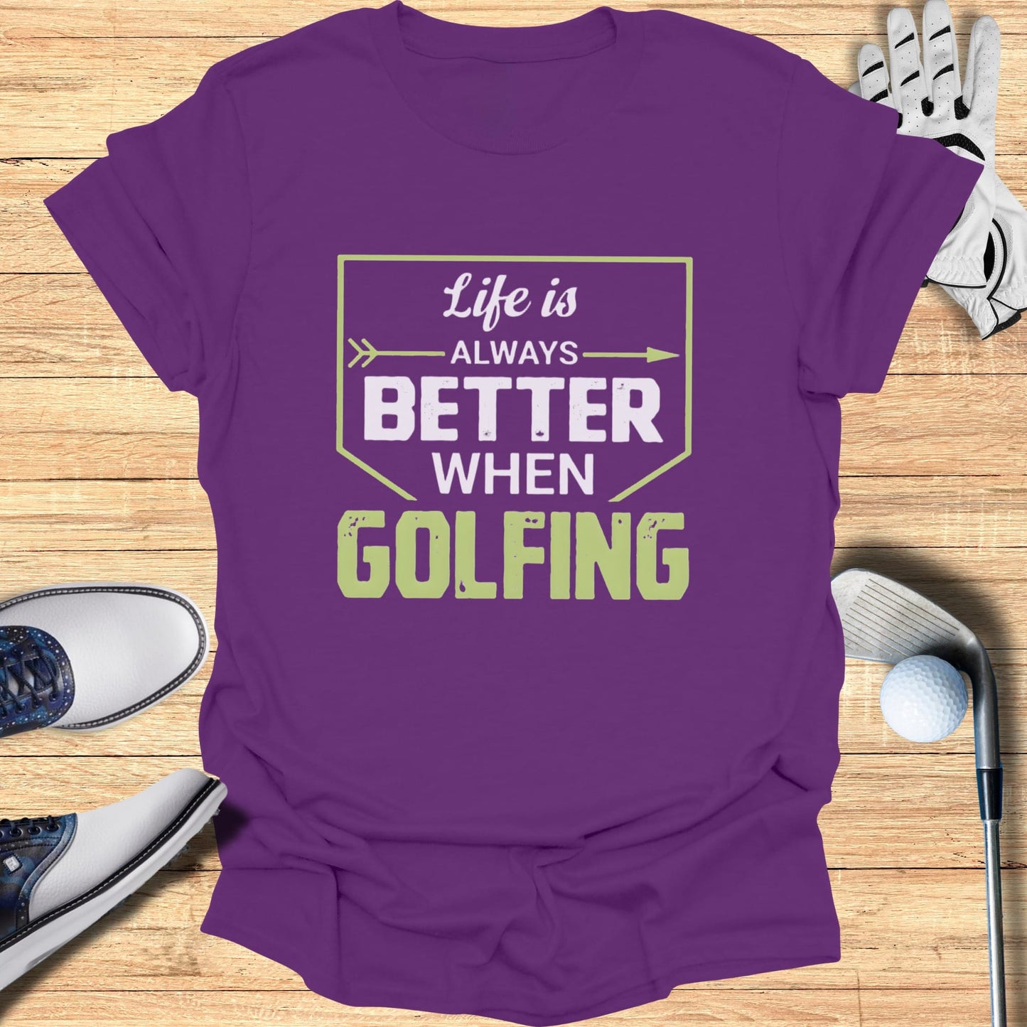 Purple t-shirt with "Life is always better when golfing" text.