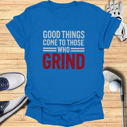 Blue t-shirt with "GOOD THINGS COME TO THOSE WHO GRIND" text.
