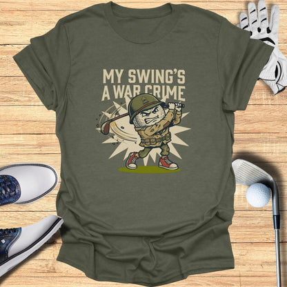 Green t-shirt with cartoon soldier golfer and text "MY SWING'S A WAR CRIME".