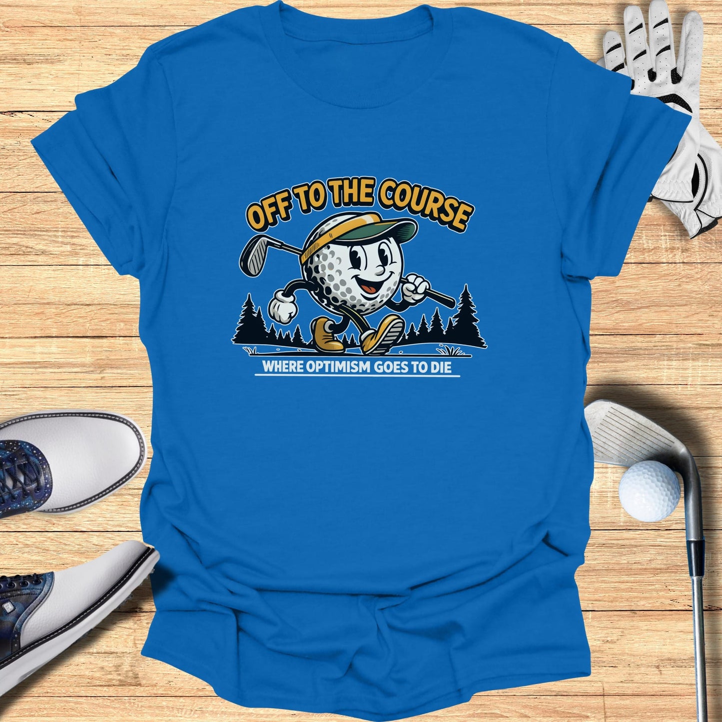 Blue t-shirt with cartoon golfer and text "OFF TO THE COURSE".