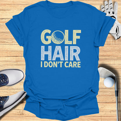 Blue t-shirt with "GOLF HAIR I DON'T CARE" text and golf ball graphic.