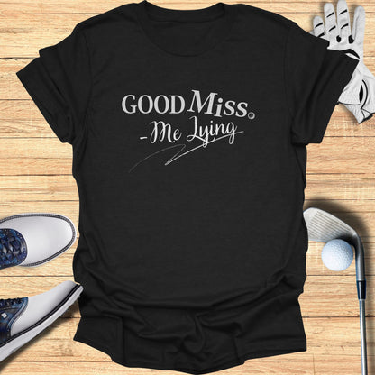 Black t-shirt with "Good Miss - Me Lying" text in white cursive.