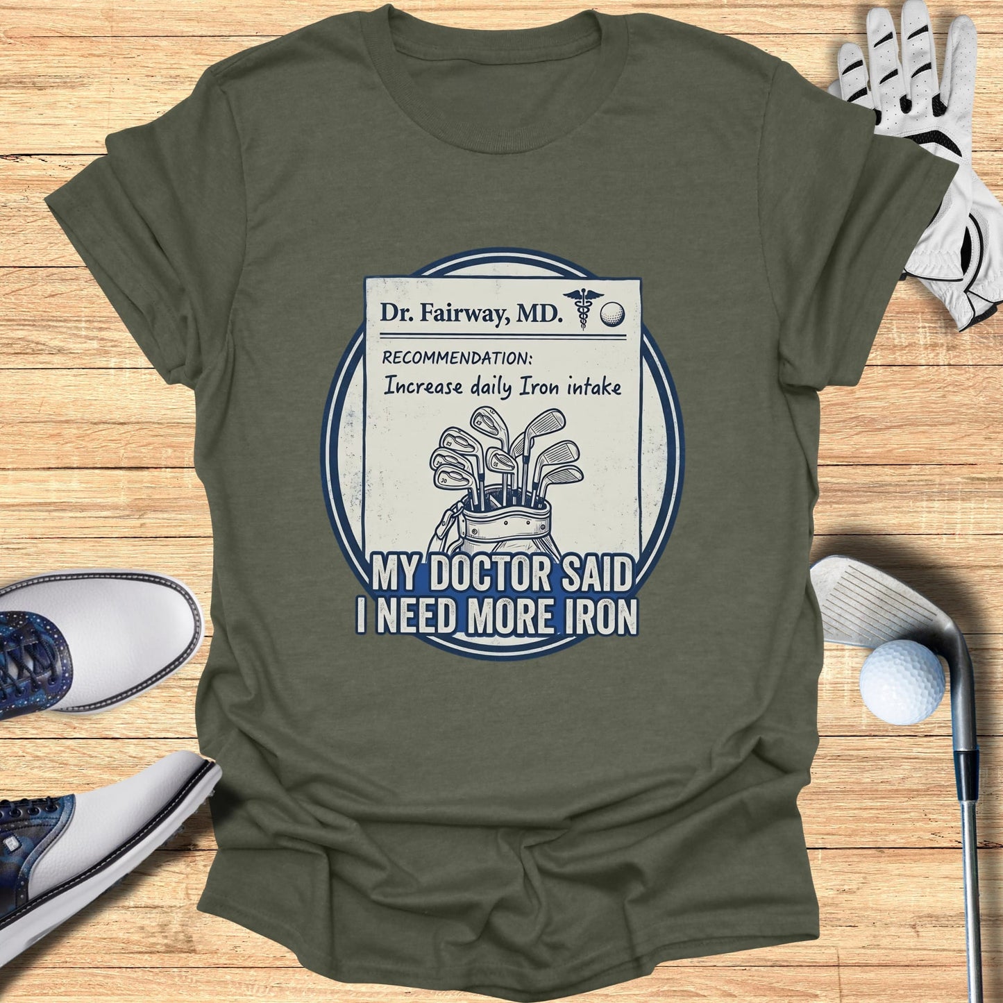 T-shirt with "My doctor said I need more iron" text and golf elements.