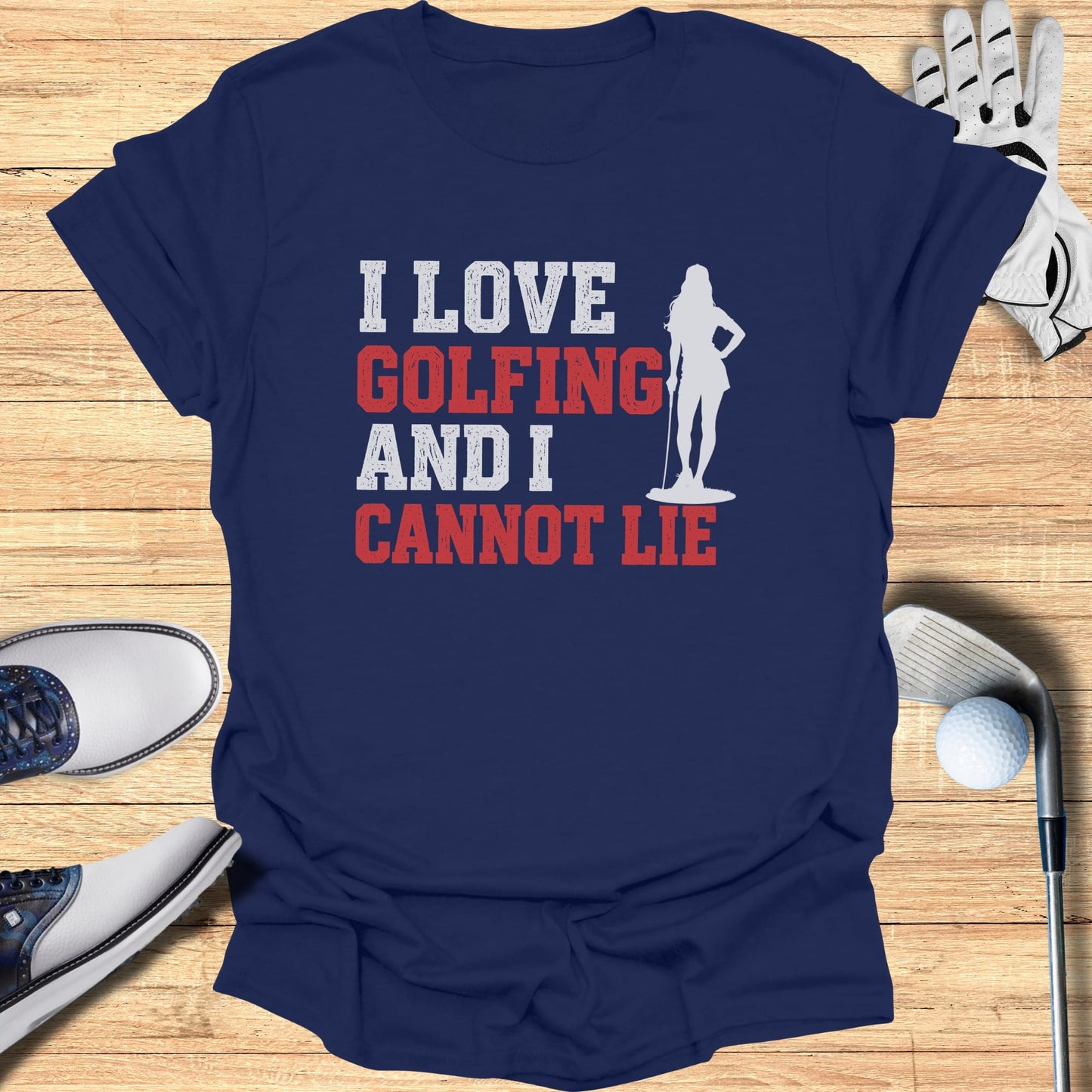 Navy t-shirt with text "I LOVE GOLFING AND I CANNOT LIE" and a woman golfer silhouette.