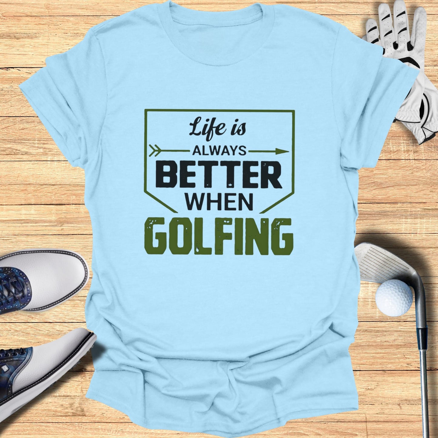 Light blue t-shirt with "Life is Better When Golfing" text design.