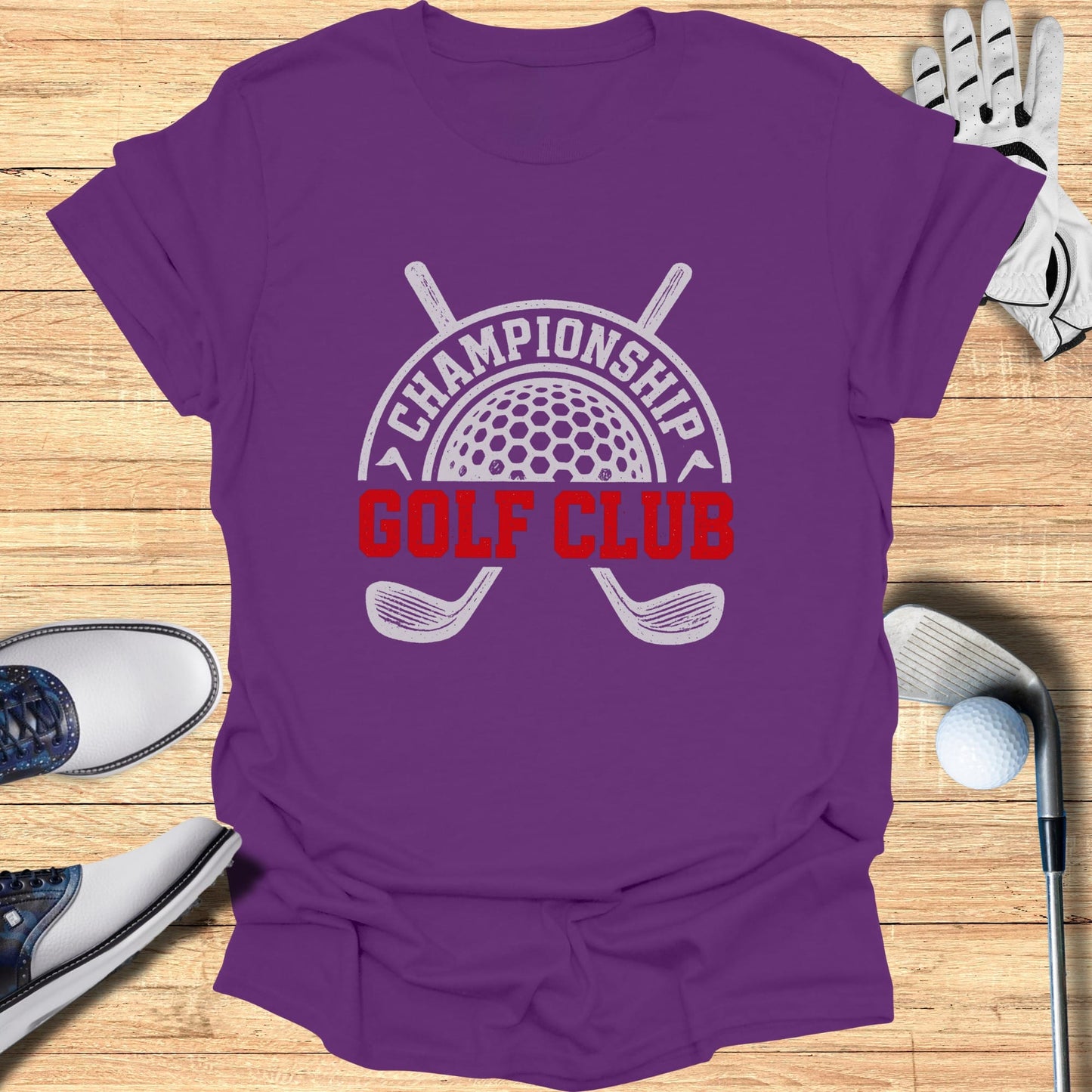 Purple t-shirt with "Championship Golf Club" logo and crossed golf clubs.