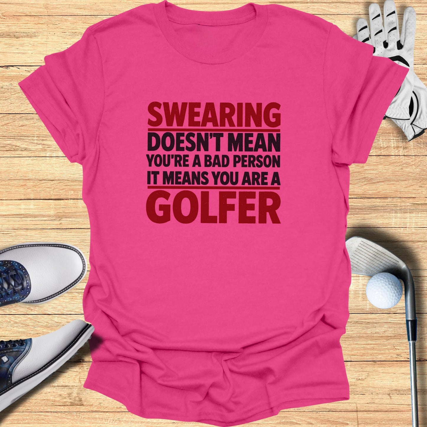 Pink t-shirt with text "Swearing doesn't mean you're a bad person it means you are a golfer".