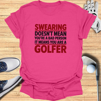 Pink t-shirt with text "Swearing doesn't mean you're a bad person it means you are a golfer".
