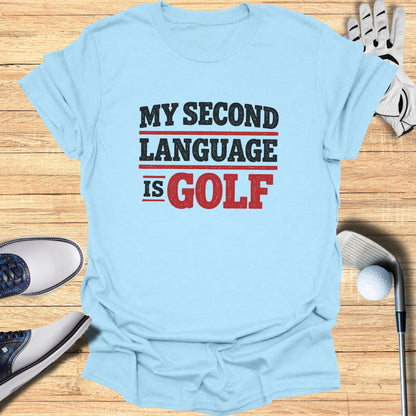 Light blue t-shirt with "MY SECOND LANGUAGE IS GOLF" text.