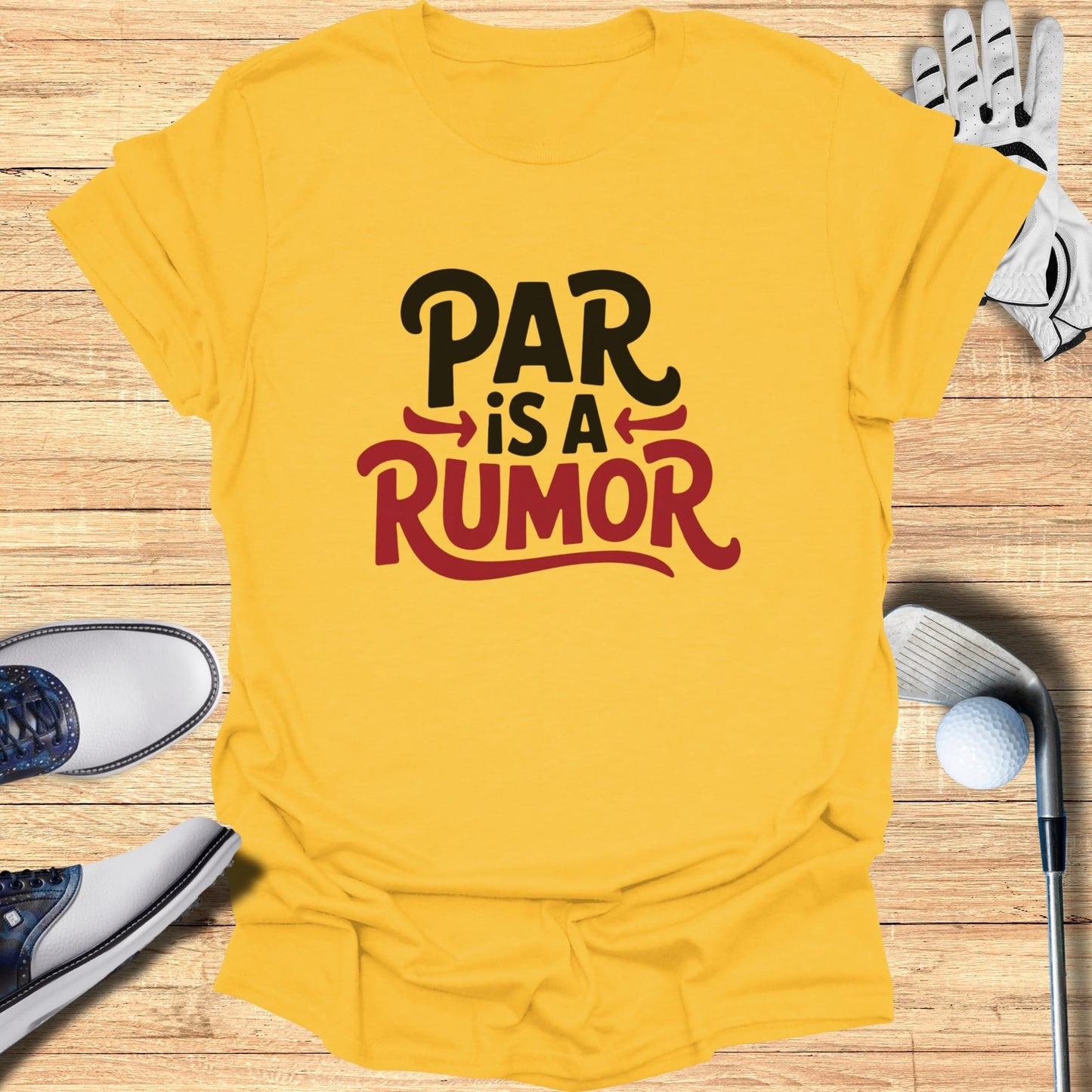 Yellow t-shirt with "PAR is a RUMOR" text, golf shoes, and golf ball.