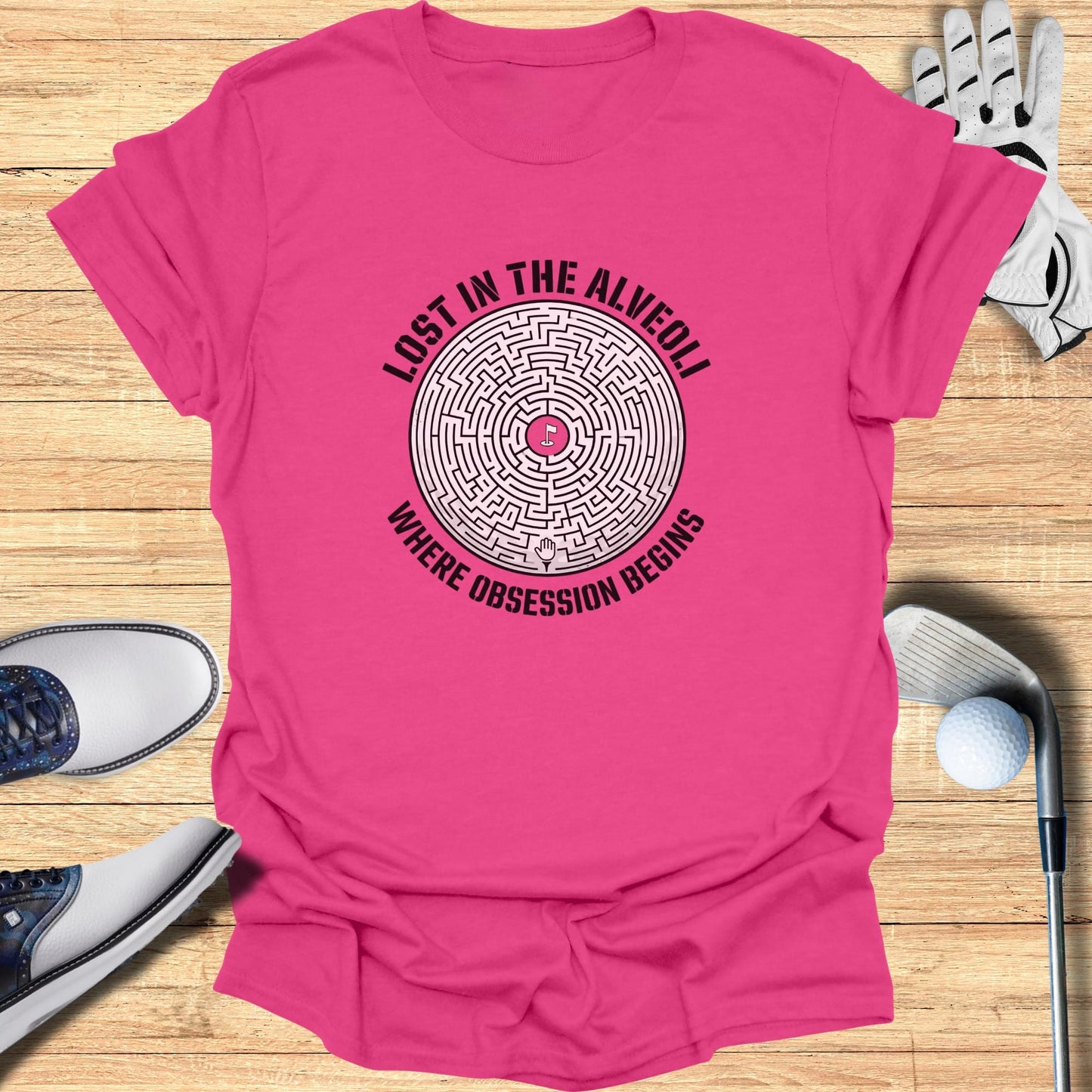 Pink t-shirt with maze graphic and text: "LOST IN THE ALVEOLI WHERE OBSESSION BEGINS".
