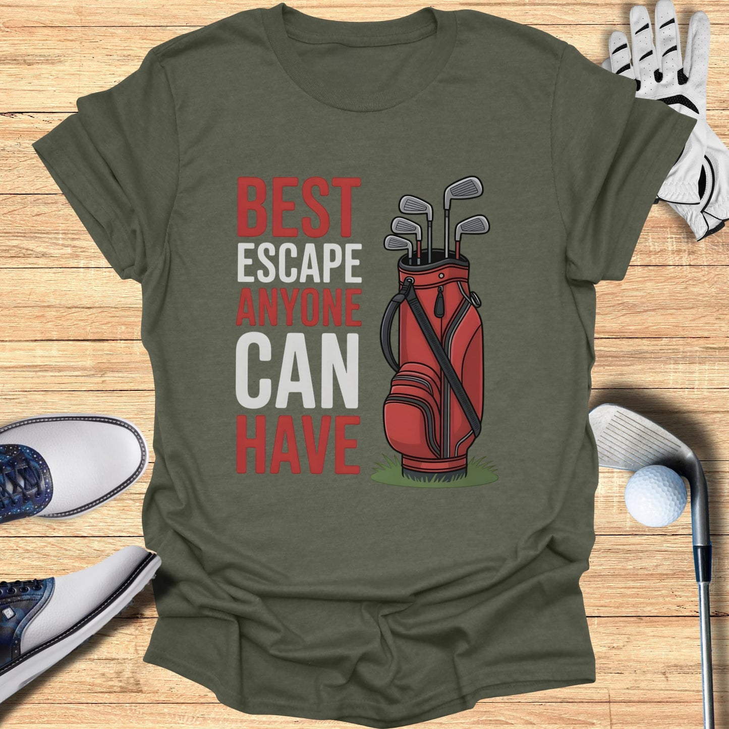 Olive green t-shirt with "BEST ESCAPE ANYONE CAN HAVE" and golf bag graphic.