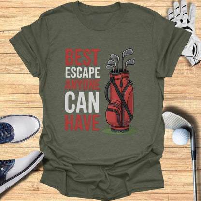 Olive green t-shirt with "BEST ESCAPE ANYONE CAN HAVE" and golf bag graphic.