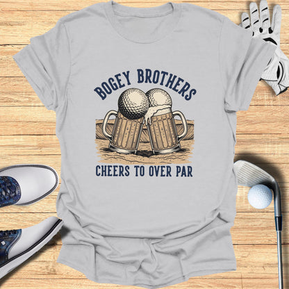 Grey t-shirt with two beer mugs shaped like golf balls and text "Bogey Brothers Cheers to Over Par".