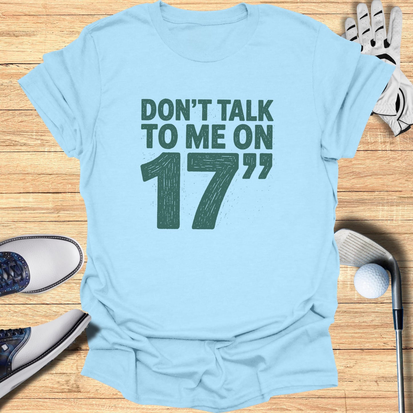 Light blue t-shirt with "Don't Talk to Me on 17" in green text.