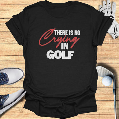 Black t-shirt with red and white text: "THERE IS NO CRYING IN GOLF".