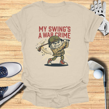 T-shirt with cartoon golfer and text "My Swing's A War Crime".